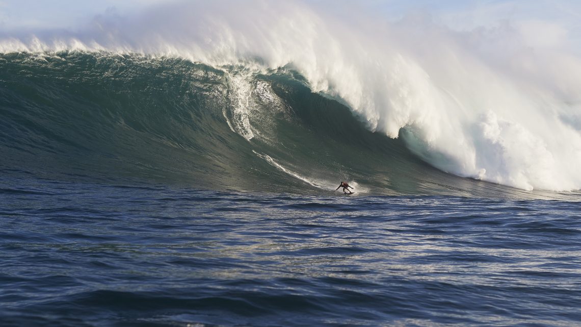 This Photographer Shoots 70-Foot Waves on His Surfboard