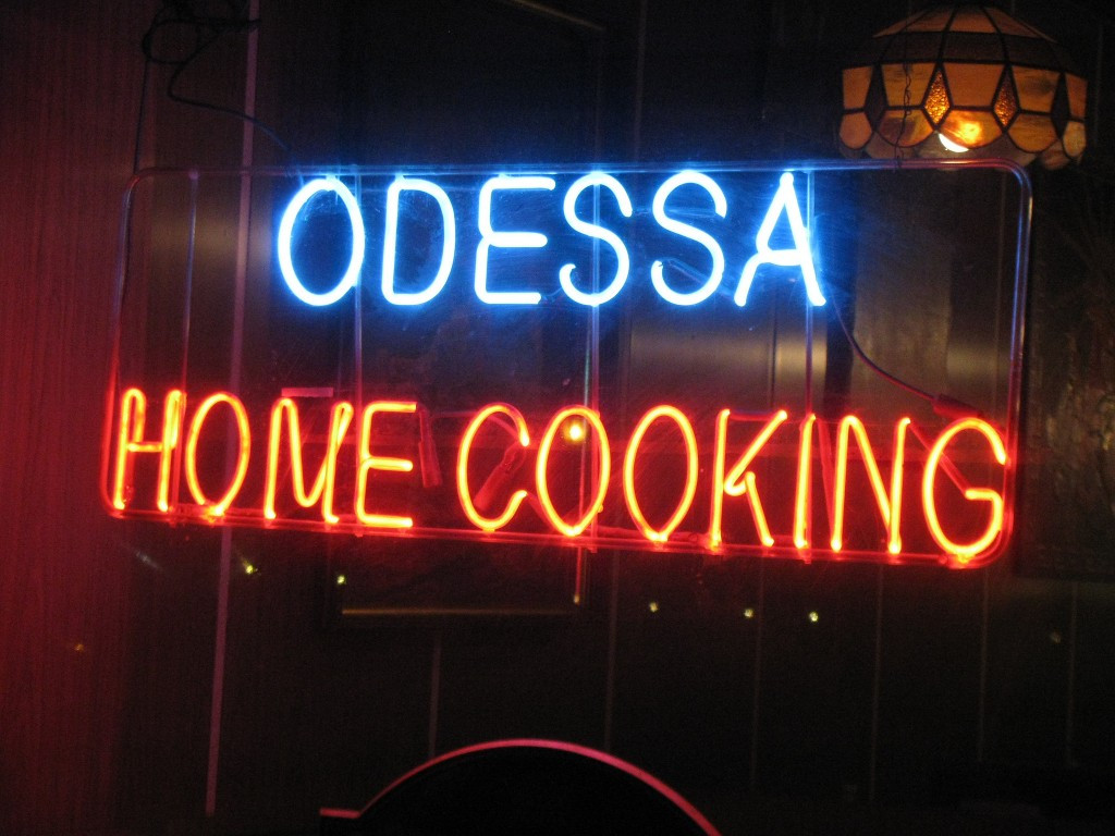 the blue and red neon sign at odessa home cooking in the east village
