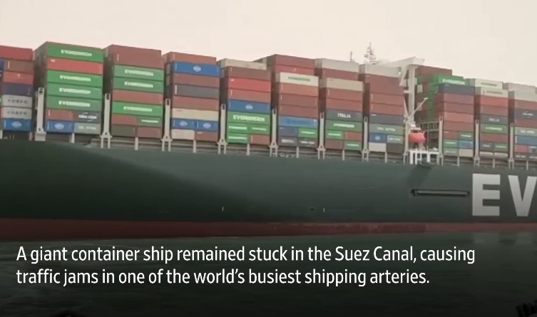 Over 100 Ships Backed Up as Vessel Stuck in Suez Canal Sideways